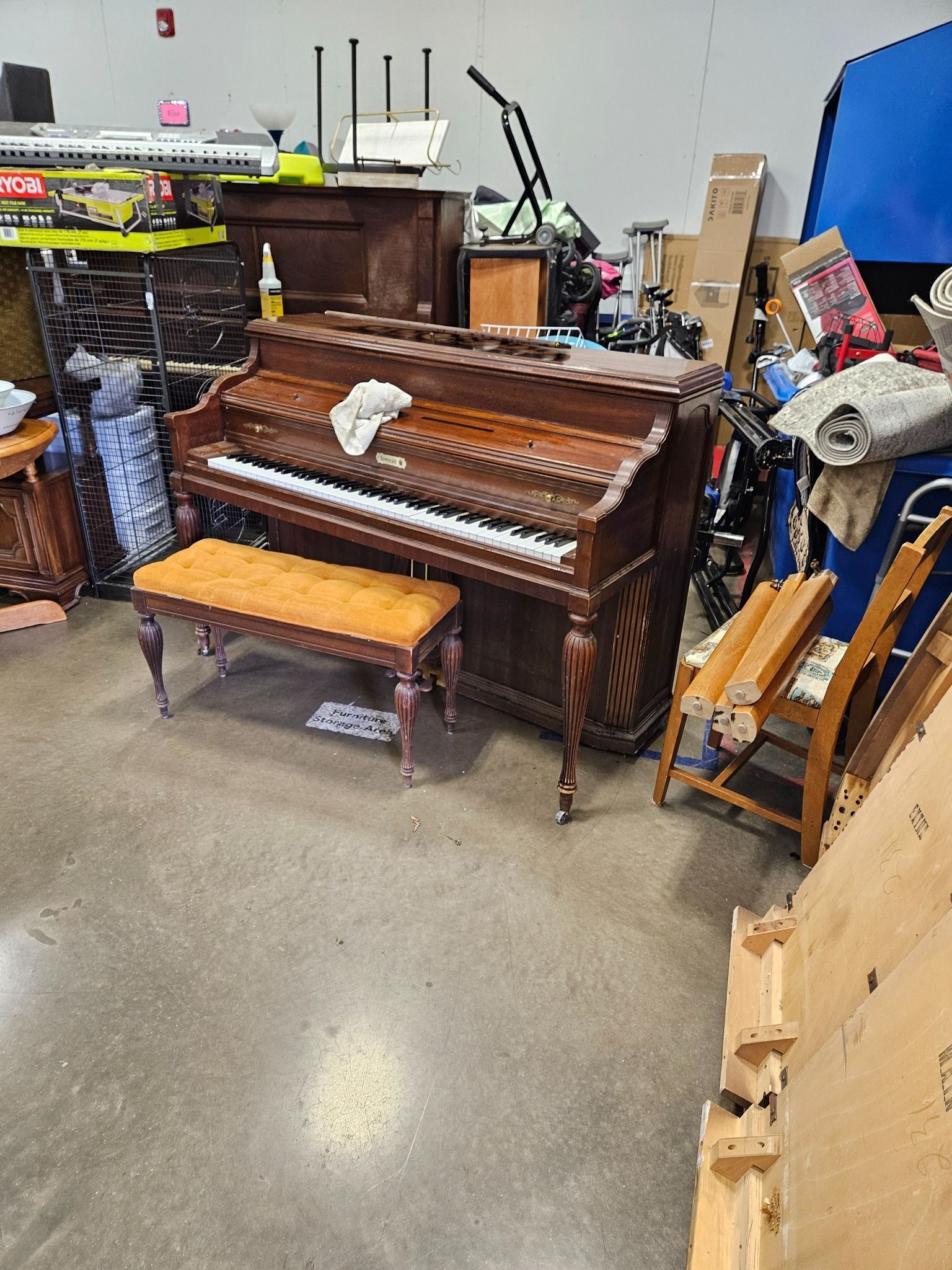 A hot tub is sitting on the side of a house.