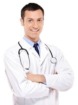 a smiling doctor with a stethoscope around his neck is standing with his arms crossed .