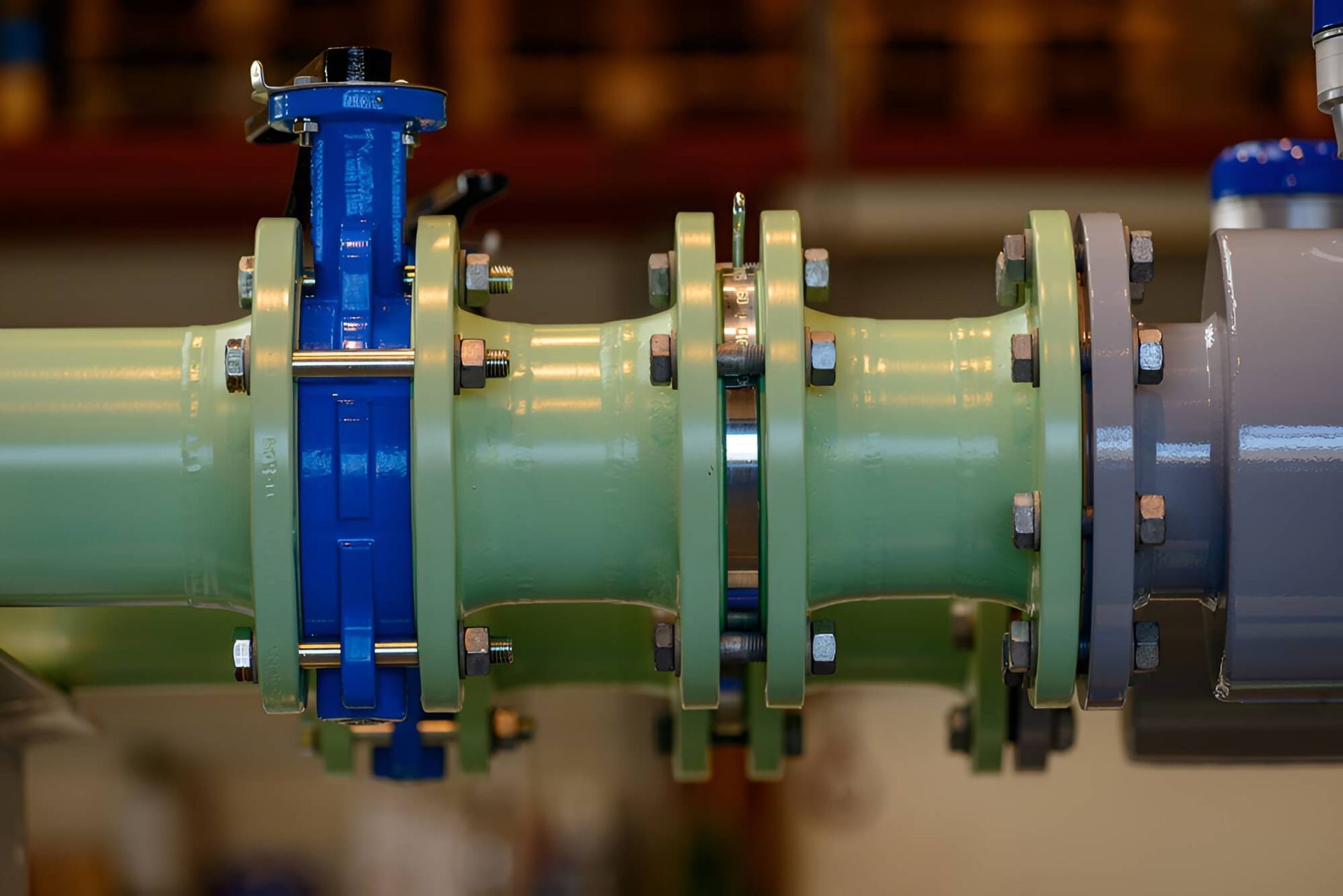 A Close Up of a Pipe With a Blue Valve on It — Elite Wastewater Solutions in Moss Vale, NSW