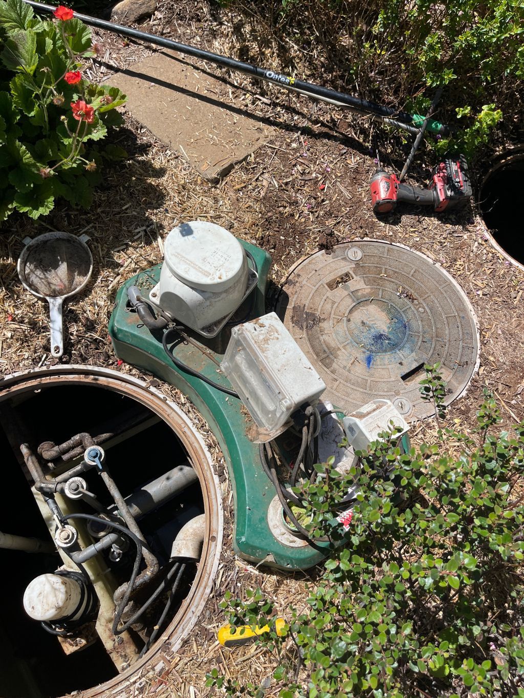 A Rusty Manhole Cover With the Words Grease Trap Written on It — Elite Wastewater Solutions in Fitzroy Falls, NSW