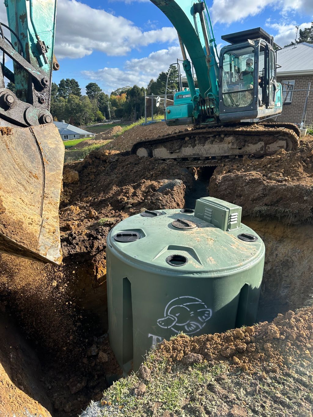 Green Field with Dirt Track — Wastewater Management in the Southern Highlands, NSW