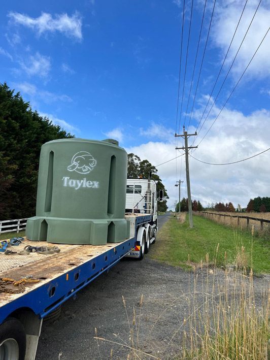 Truck at the Side of the Road Loaded with Taylex Septic Tank — Wastewater Management in the Southern Highlands, NSW