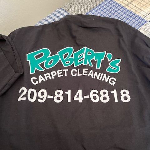 The back of a robert 's carpet cleaning t-shirt