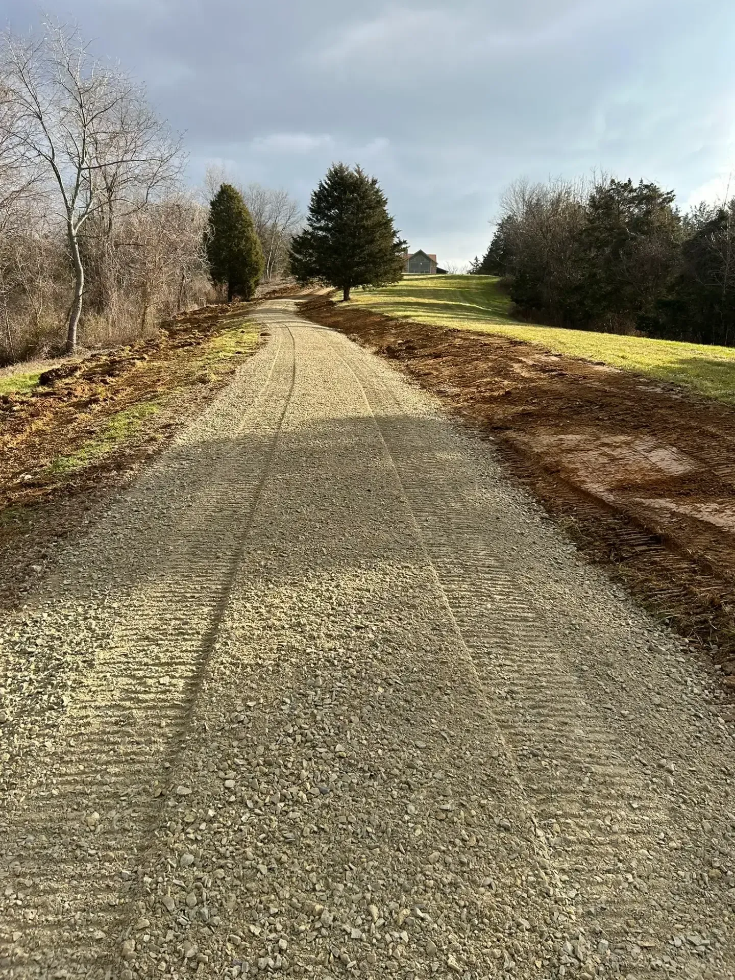 A driveway installation in Sellersburg, IN by Earth Shaping LLC
