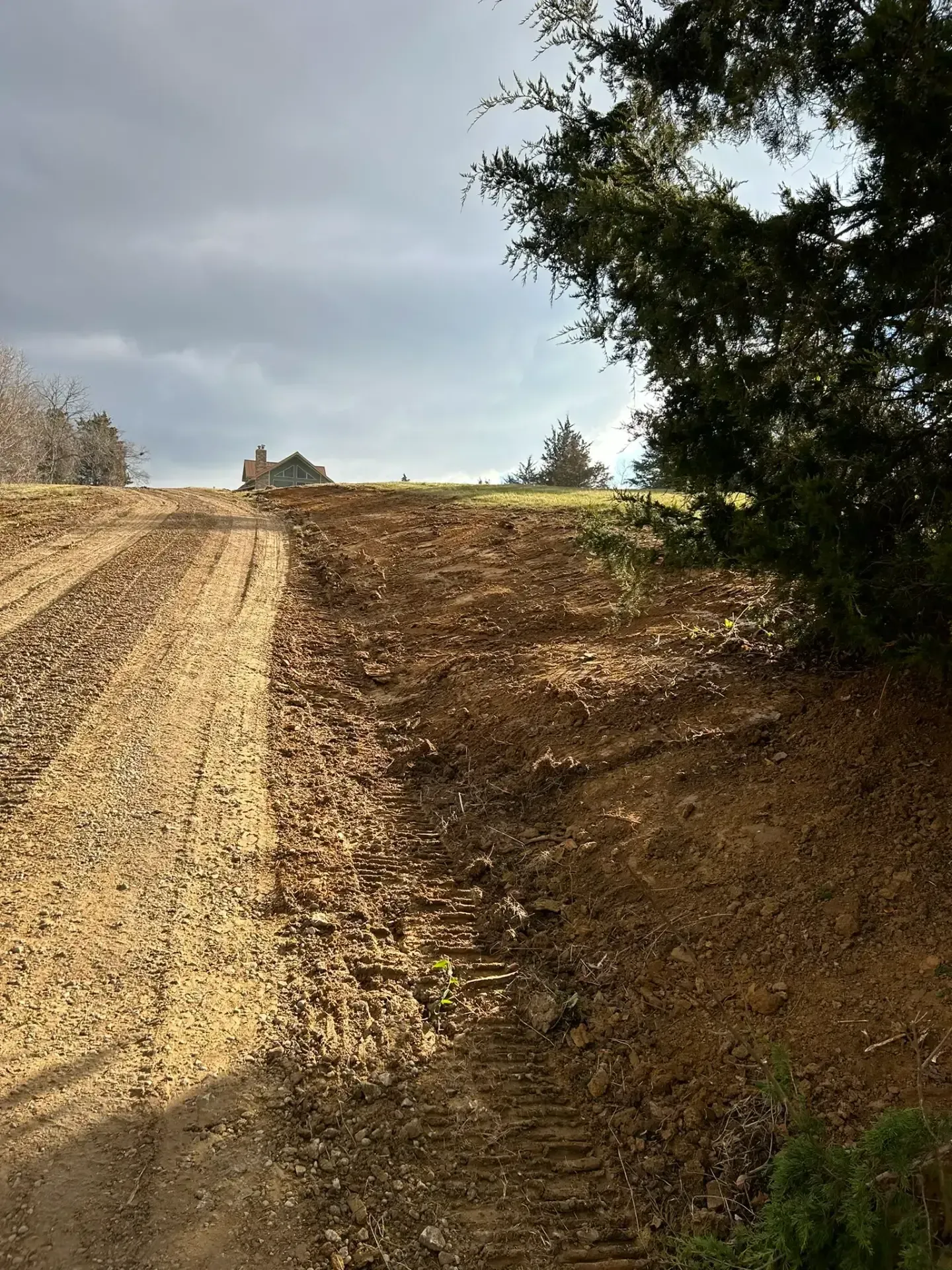 A driveway installation in Madison, IN by Earth Shaping LLC