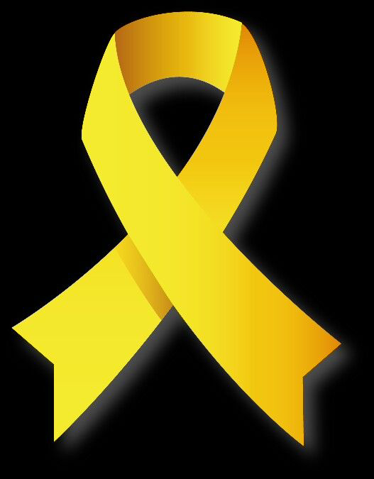 Yellow ribbon, symbol of support and awareness on a black background.