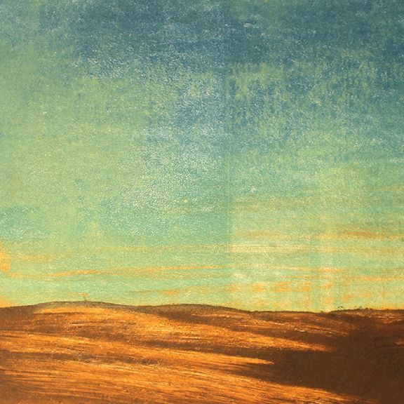 Orange-brown land under a turquoise and blue gradient sky; an abstract landscape.