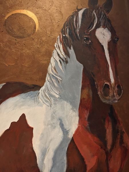 A painting of a brown and white horse with a crescent moon in the background