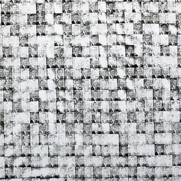 A black and white photo of a checkered pattern on a wall.
