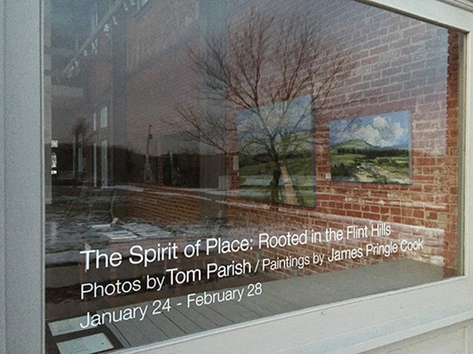 A window with the words `` the spirit of place '' written on it