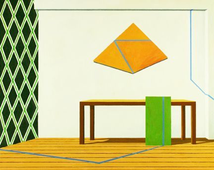Geometric interior: Orange pyramid art, green rectangle, diamond wallpaper, table.