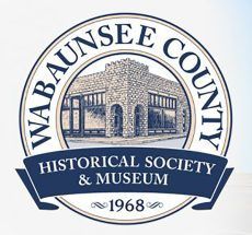 The logo for the wabansee county historical society and museum.
