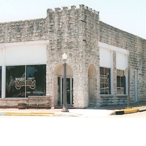 A brick building with a sign that says walmart county