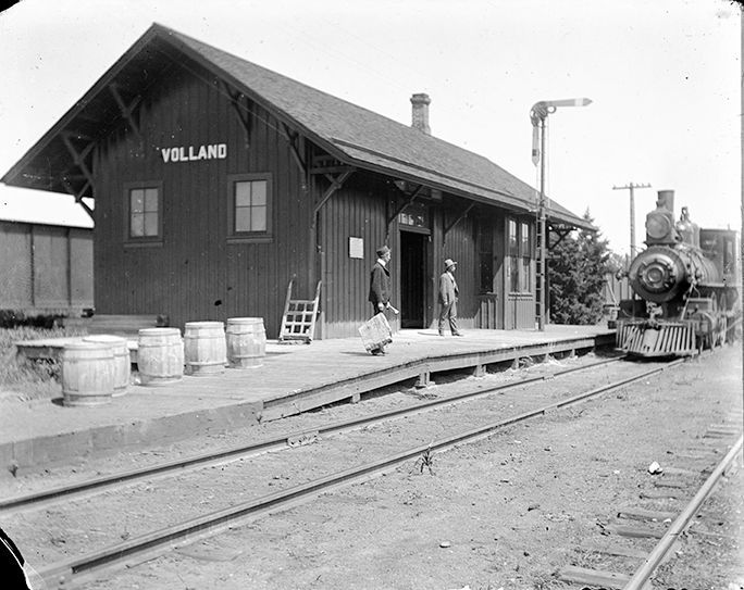A black and white photo of a train station in velland