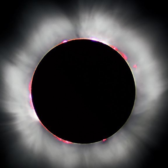 A partial eclipse of the sun with a black circle in the middle