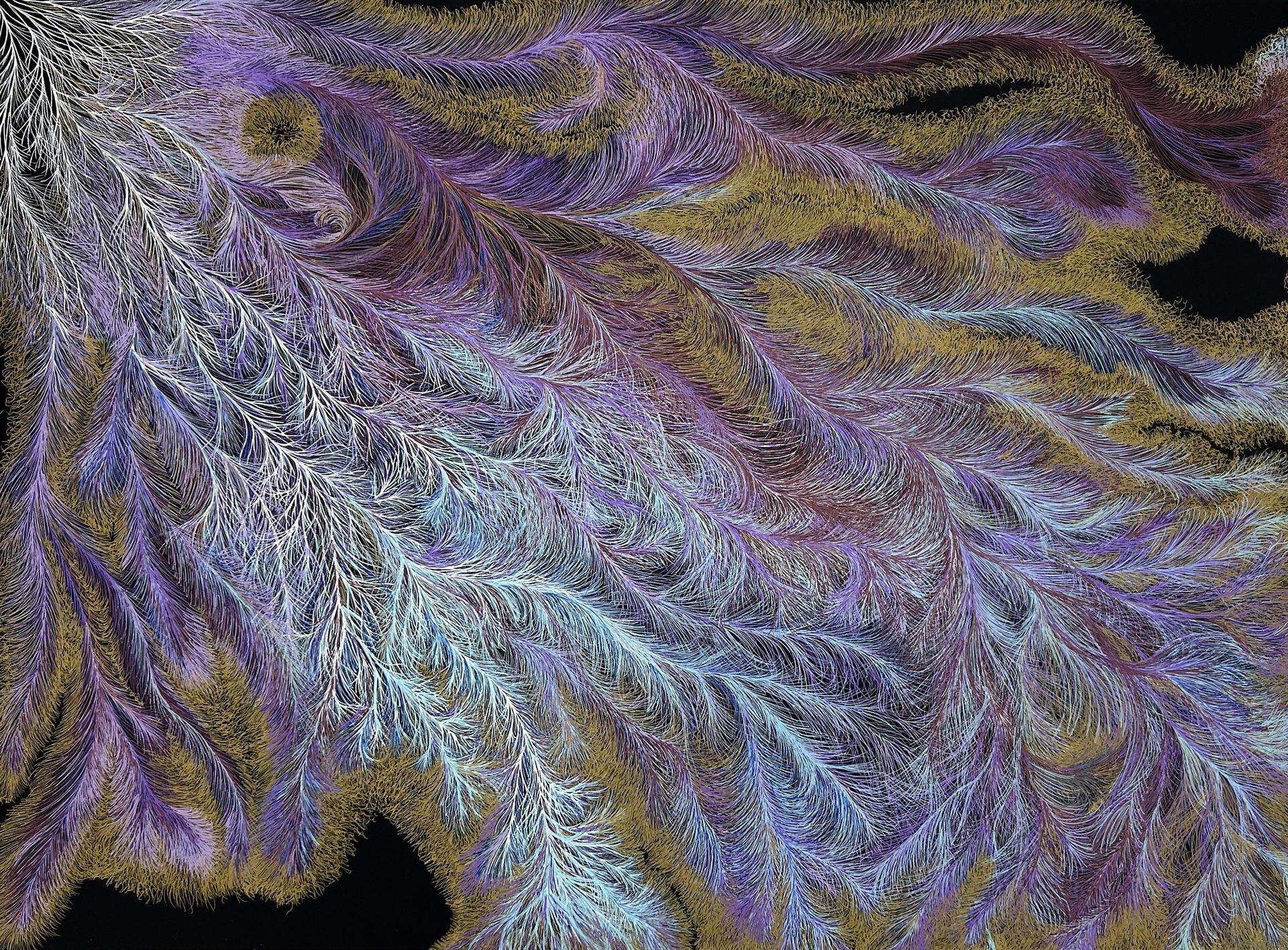 Abstract swirling pattern in shades of purple, blue, and gold against a black background.