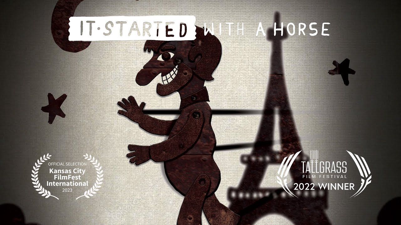 Animated figure with Eiffel Tower, film title:
