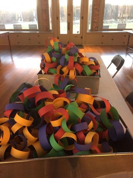 A bunch of colorful paper ribbons on a table