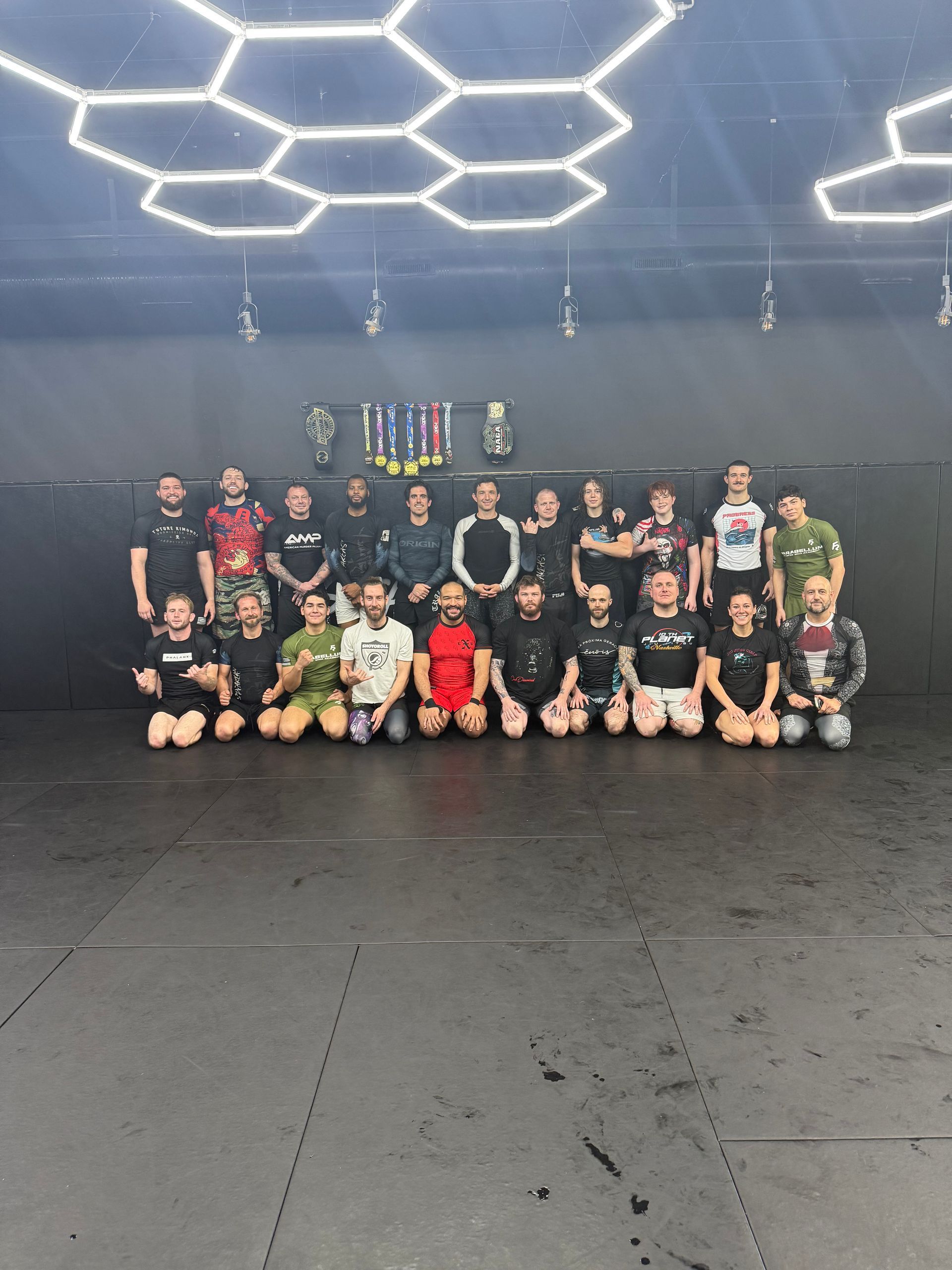 Adults and kids training Jiu-Jitsu at Speakeasy Jiu-Jitsu & Wrestling Academy in Asheville, NC for confidence