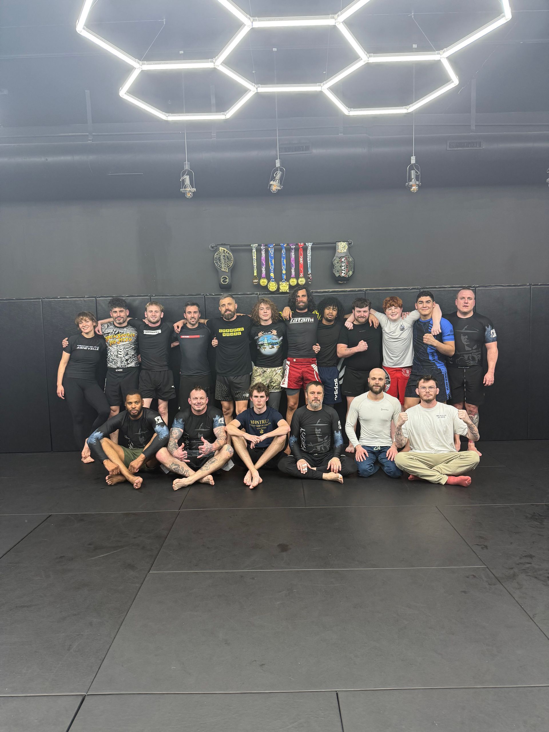 Students drilling Jiu-Jitsu at Speakeasy Jiu-Jitsu & Wrestling Academy in Asheville, NC to build fitness and focus.