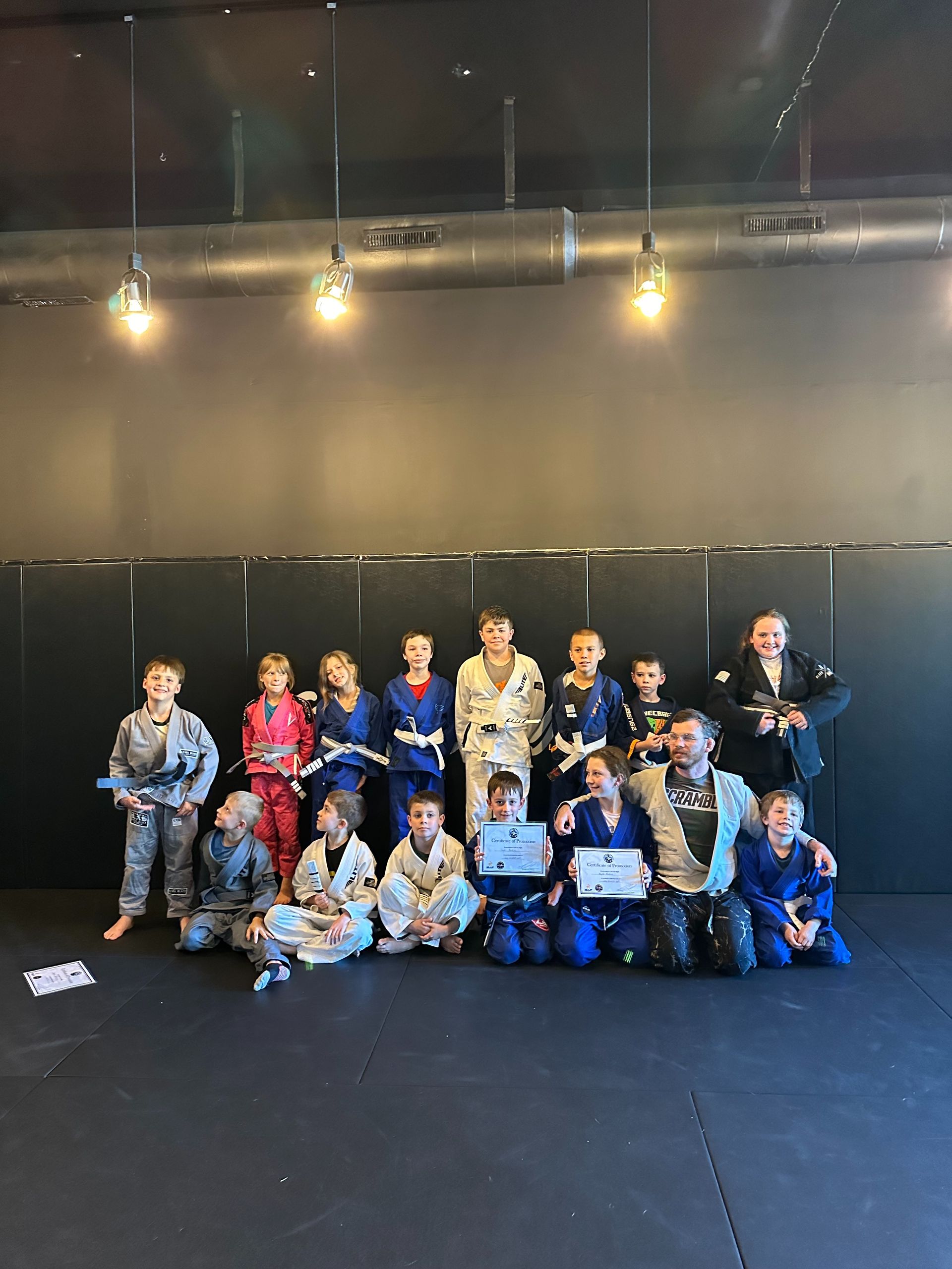 Training partners practice controlled grappling at Speakeasy Jiu-Jitsu & Wrestling Academy in Asheville, NC for fitness and focus.