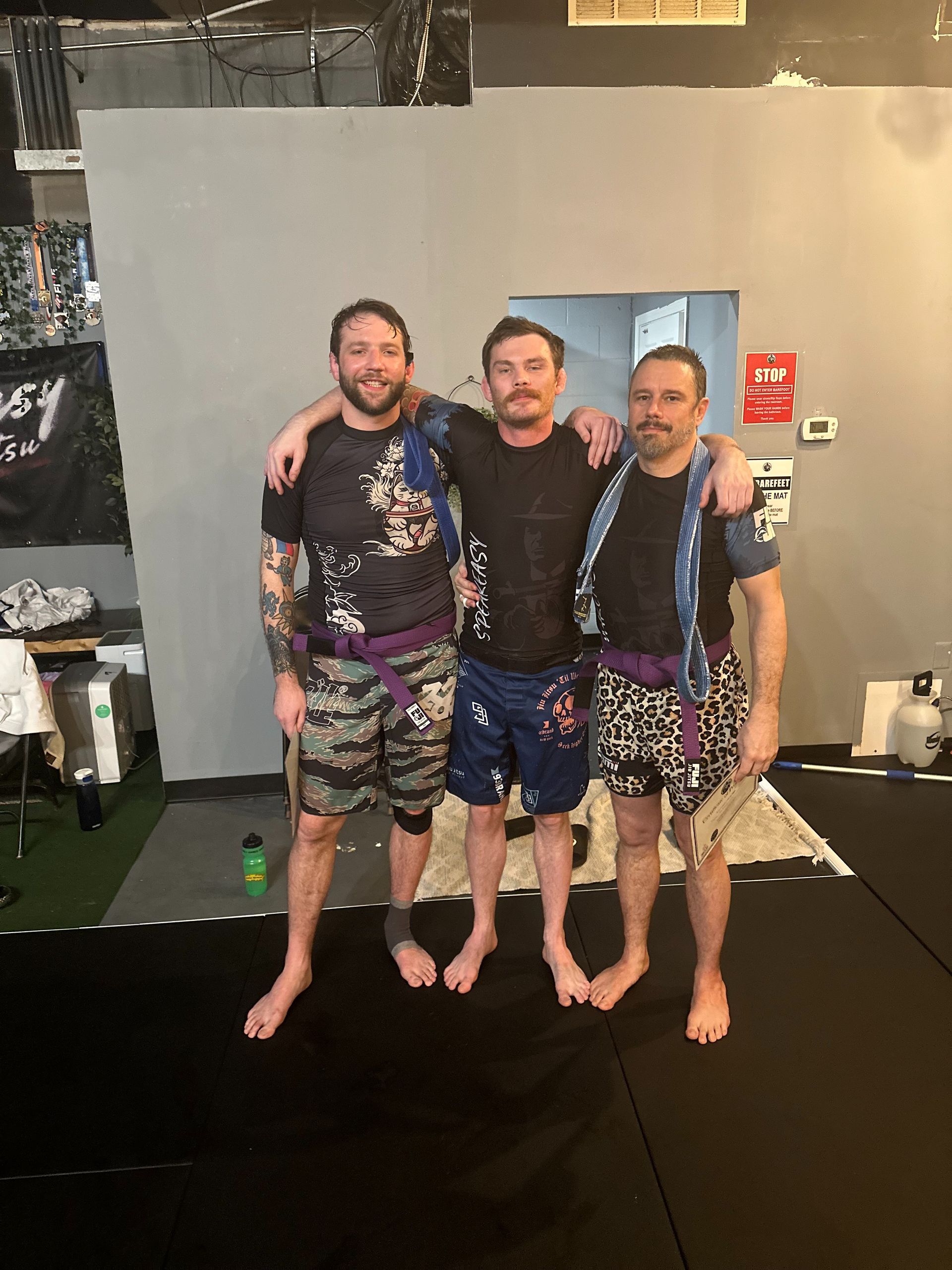 Family training on the mats at Speakeasy Jiu-Jitsu & Wrestling Academy in Asheville, NC, building confidence