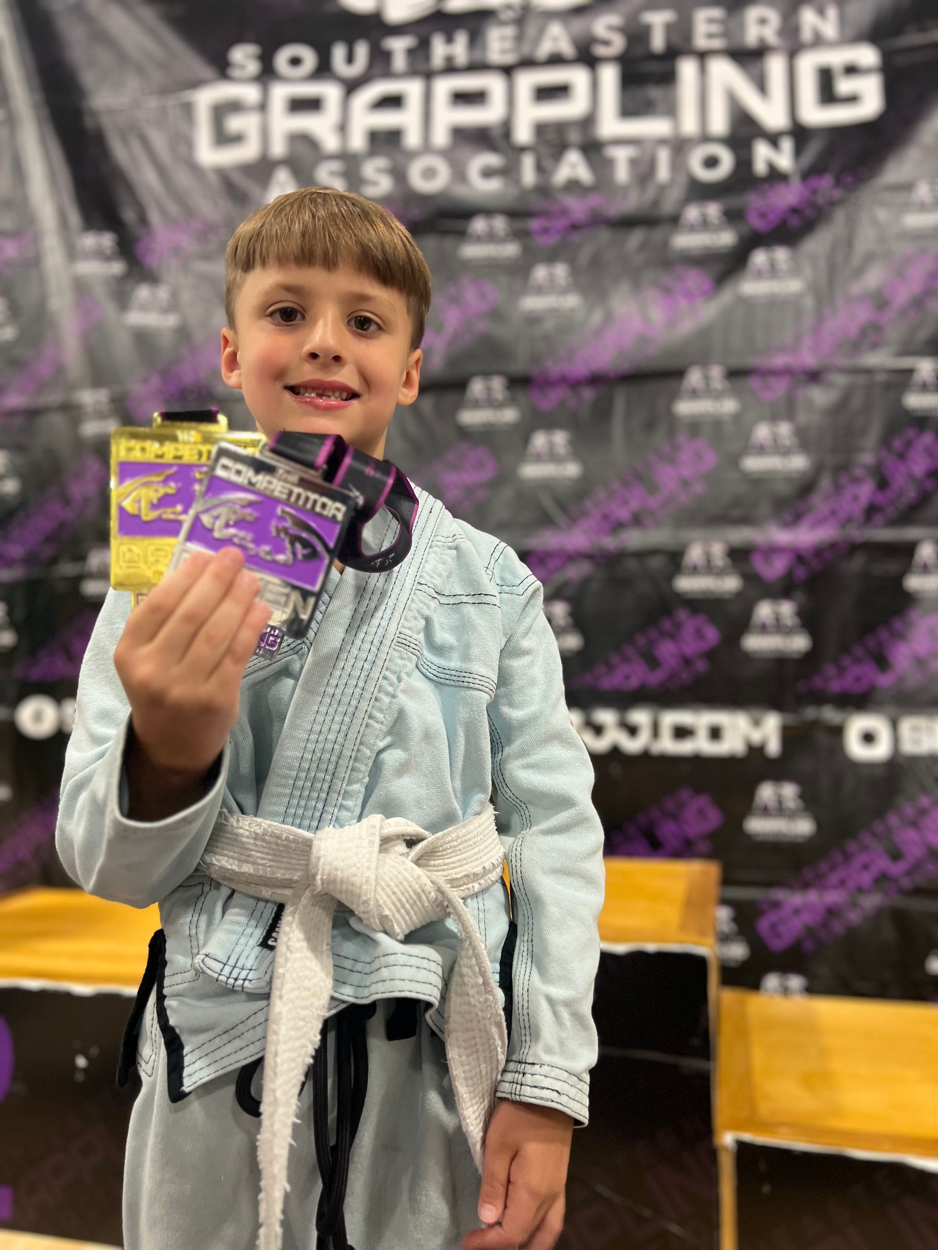 Adult students drilling Jiu-Jitsu basics at Speakeasy Jiu-Jitsu & Wrestling Academy in Asheville, NC for confidence.