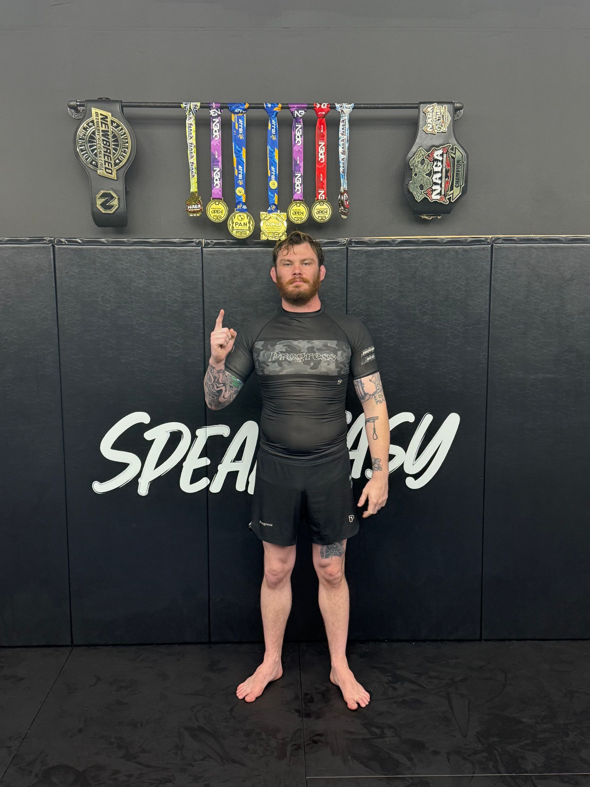 Adults practicing Jiu-Jitsu self-defense drills at Speakeasy Jiu-Jitsu & Wrestling Academy in Asheville, NC for confidence