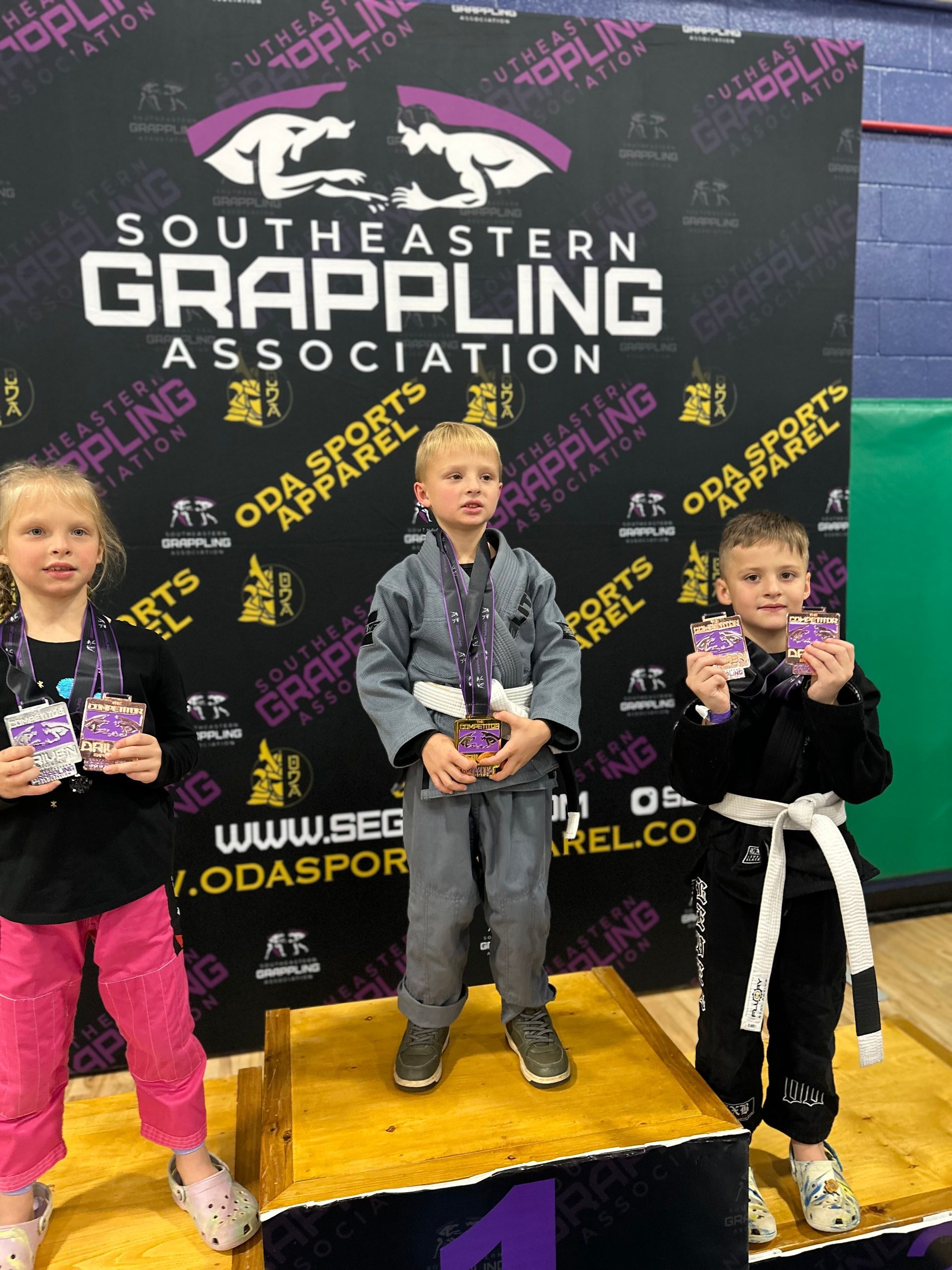 Kids practice controlled grappling drills at Speakeasy Jiu-Jitsu & Wrestling Academy in Asheville, NC, building confidence.