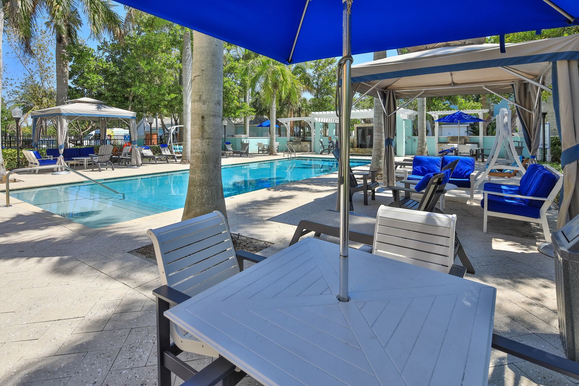 Outdoor Pool and Chairs  | The Pearl