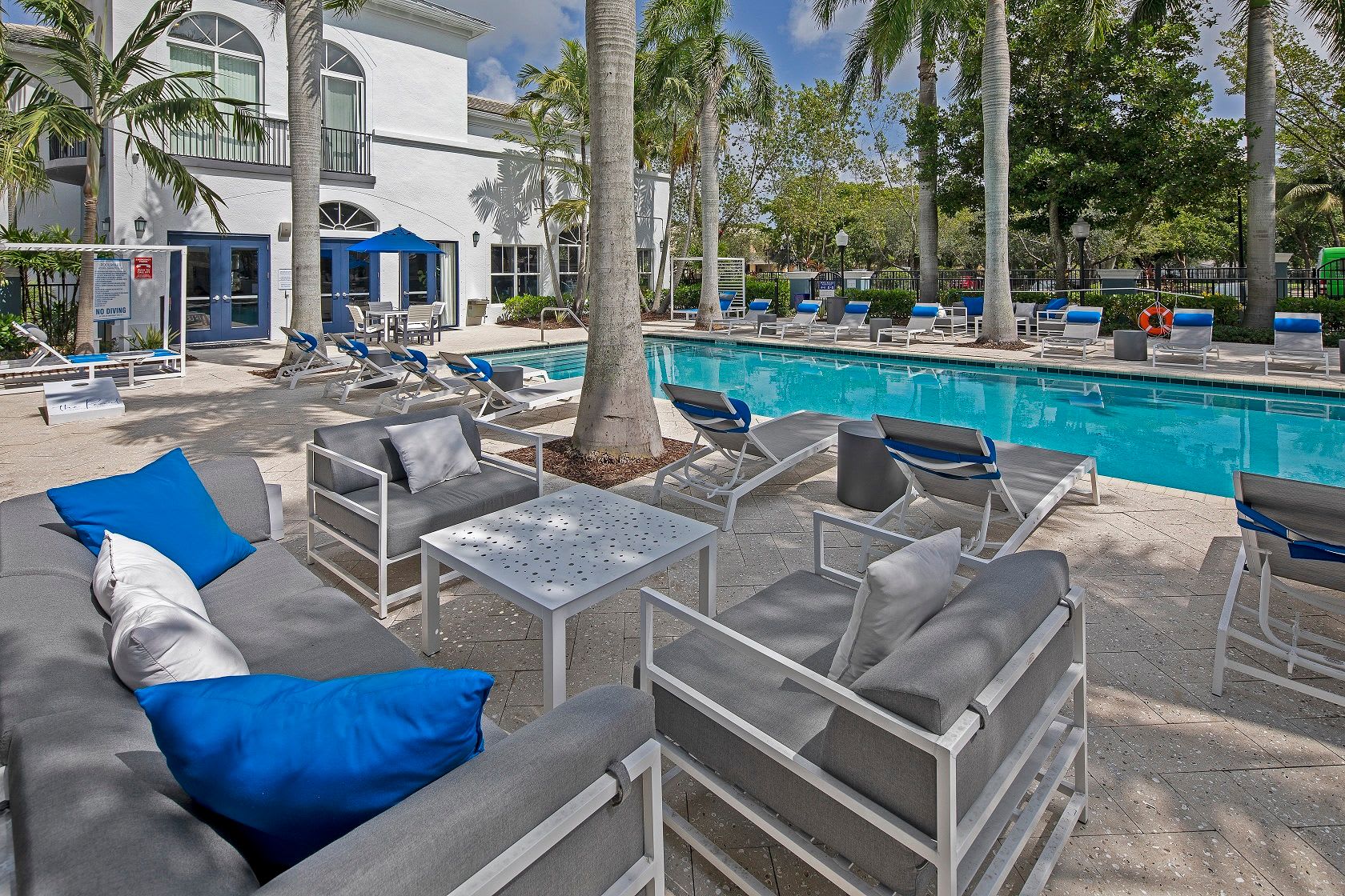 Outdoor Pool and Chairs | The Pearl