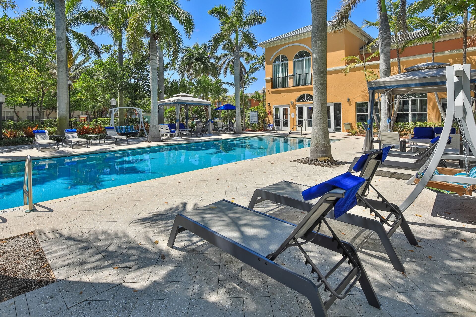 Outdoor Pool and Chairs | The Pearl