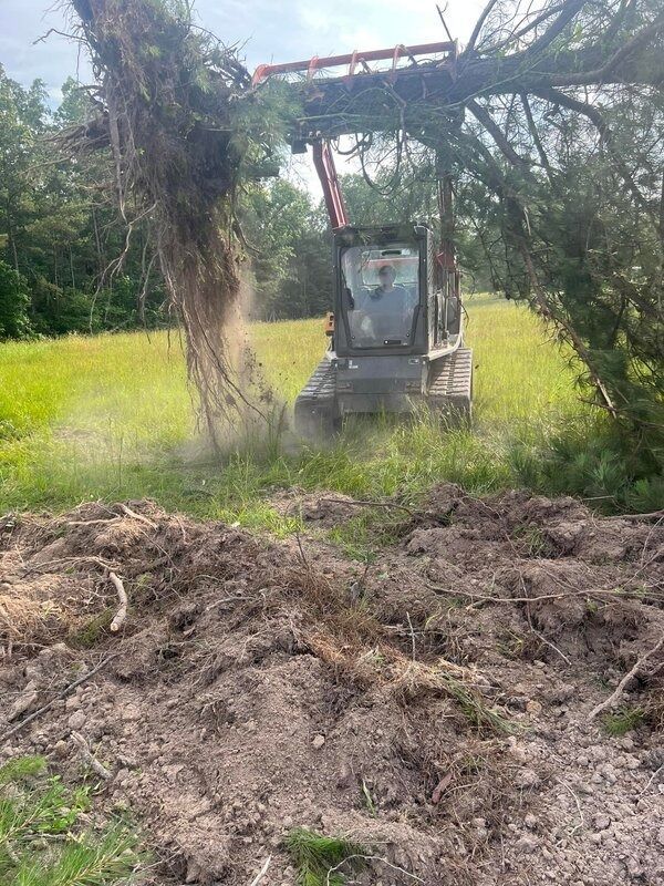 Family gathered at a dining table in a kitchen. They are eating and talking together.