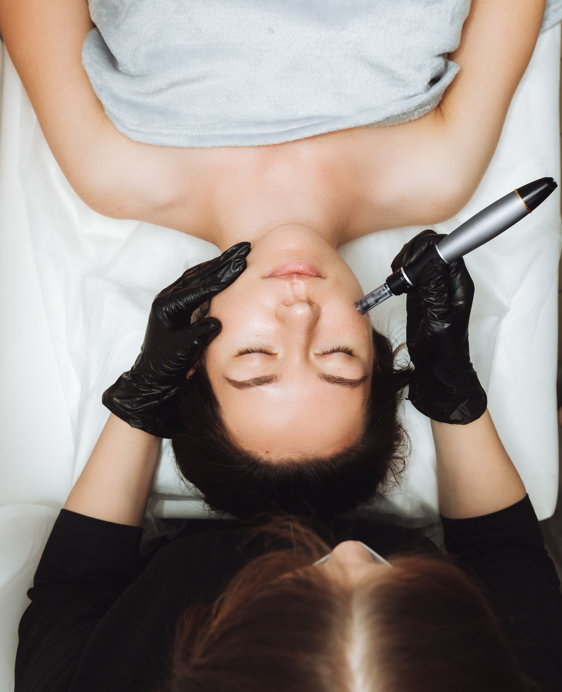 person getting microdermabrasion treatments