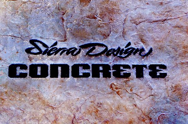 A sign that says sierra design concrete on it