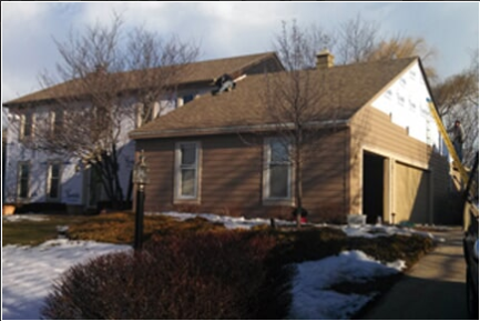 Emergency Restoration Service — House Exterior With Snow in Waukesha, WI
