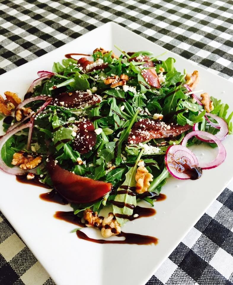 salad with lettuce, onions, vegetables and dressing