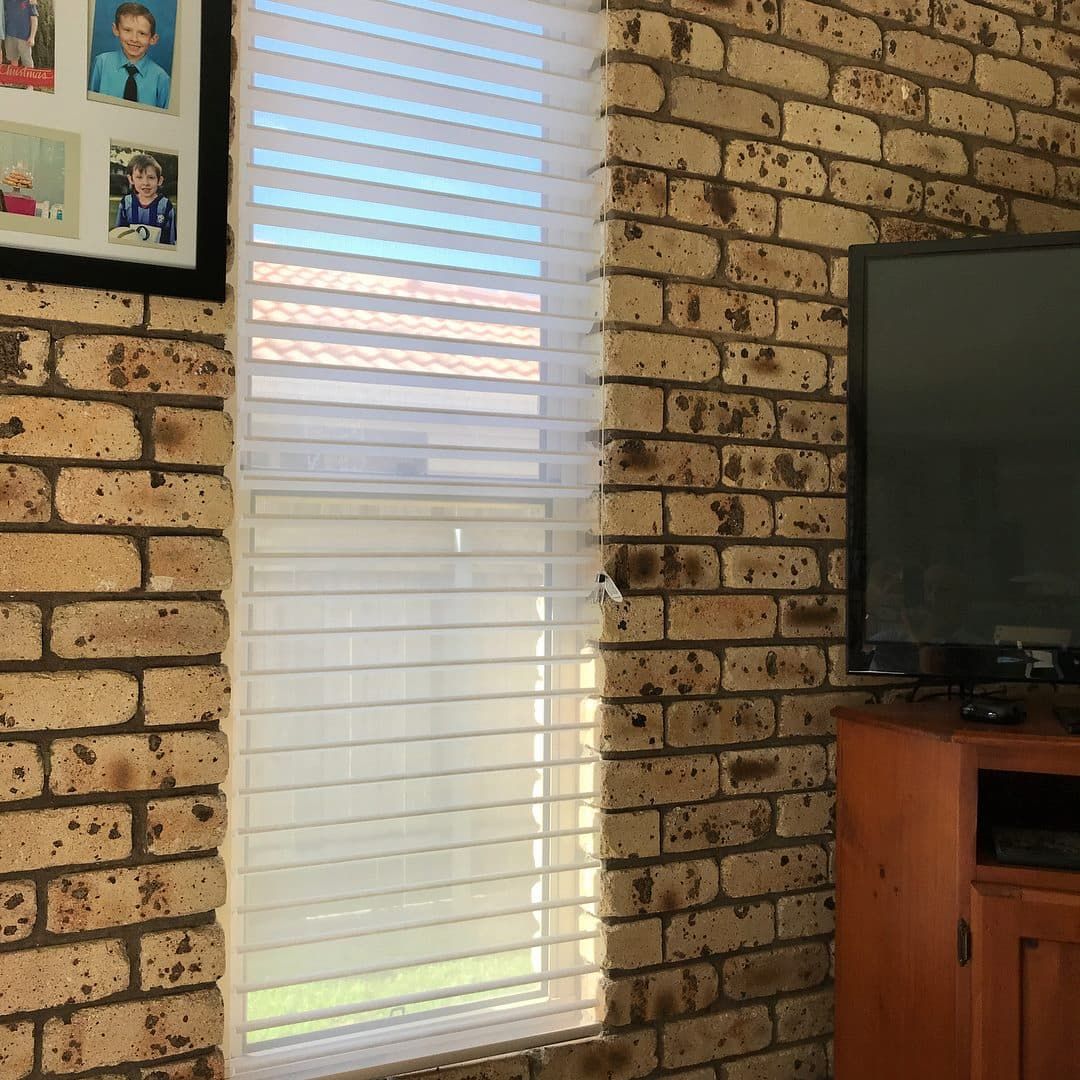 Window With White Blinds Against a Brick Wall — BlindDESIGN in Mullumbimby, NSW