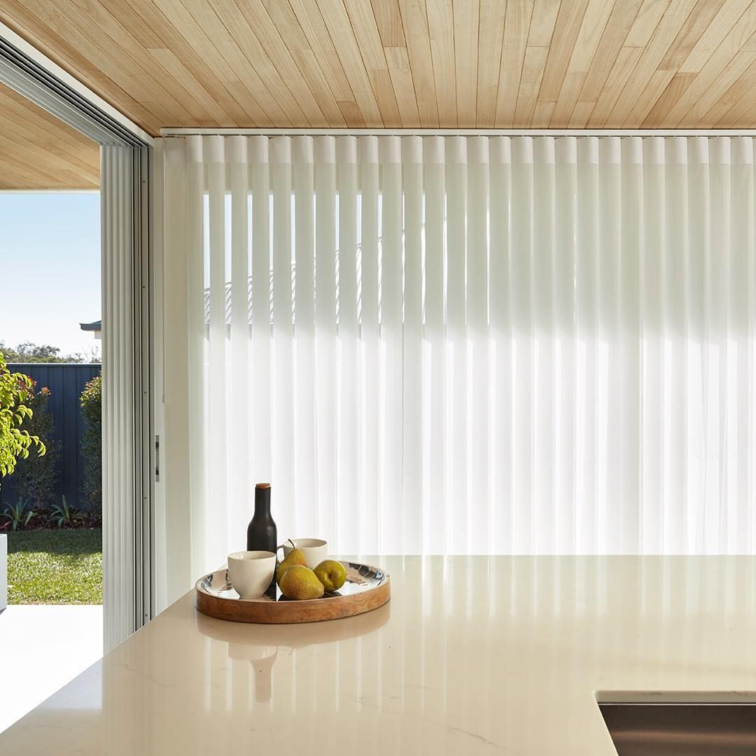 Kitchen With White Blinds, Wooden Ceiling, and a Countertop With a Tray of Items — BlindDESIGN in Byron Bay, NSW