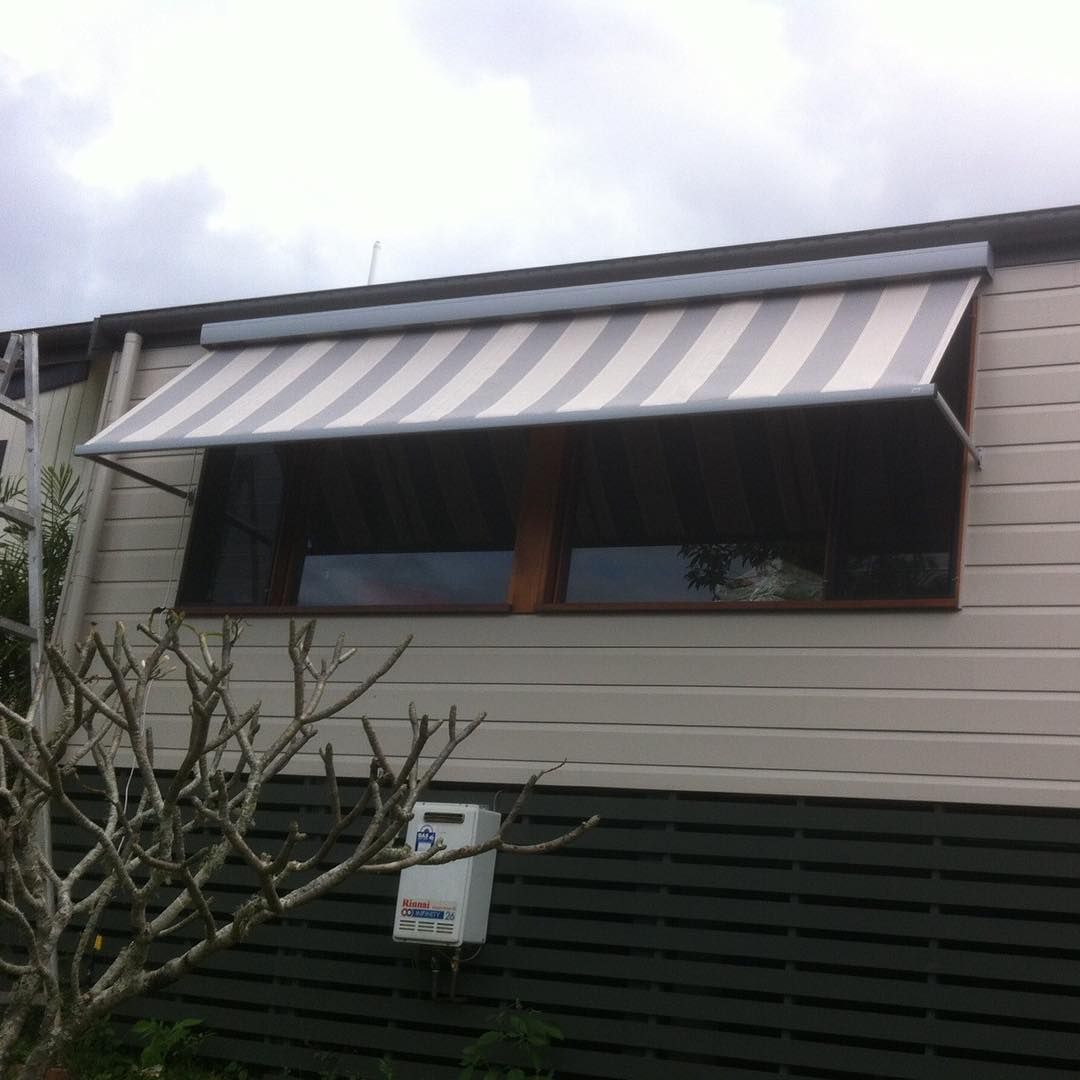 Striped Awning Over a Window on a Light-coloured Building — BlindDESIGN in Mullumbimby, NSW