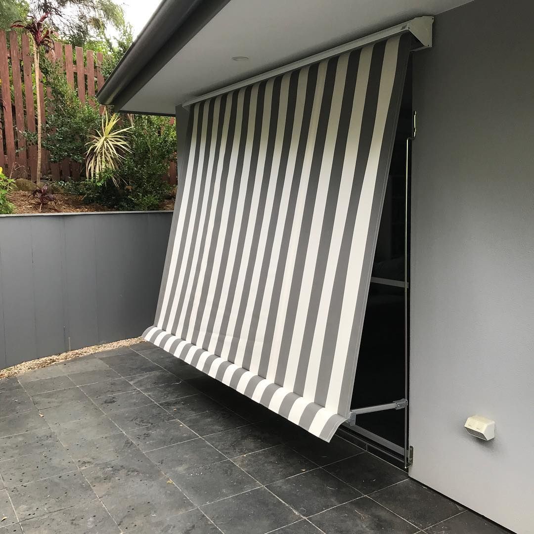 Exterior View of Gray and White Striped Awning — BlindDESIGN in Byron Bay, NSW
