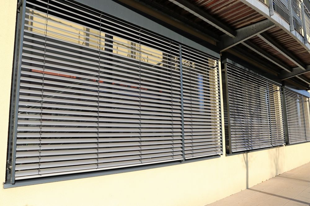 Exterior View of Building Windows with Horizontal Blinds — BlindDESIGN in Byron Bay, NSW