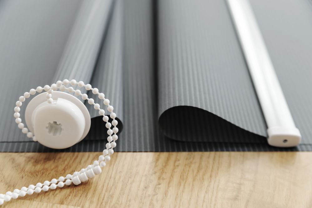 Gray Roller Shade with White Beaded Cord — BlindDESIGN in Byron Bay, NSW