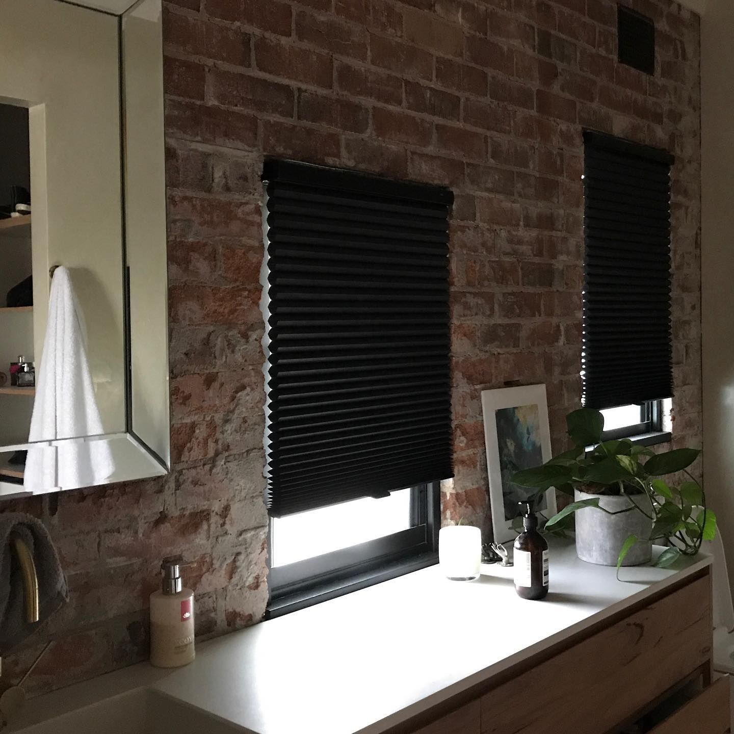 Black Blinds on Brick Wall Windows in a Bathroom — BlindDESIGN in Byron Bay, NSW