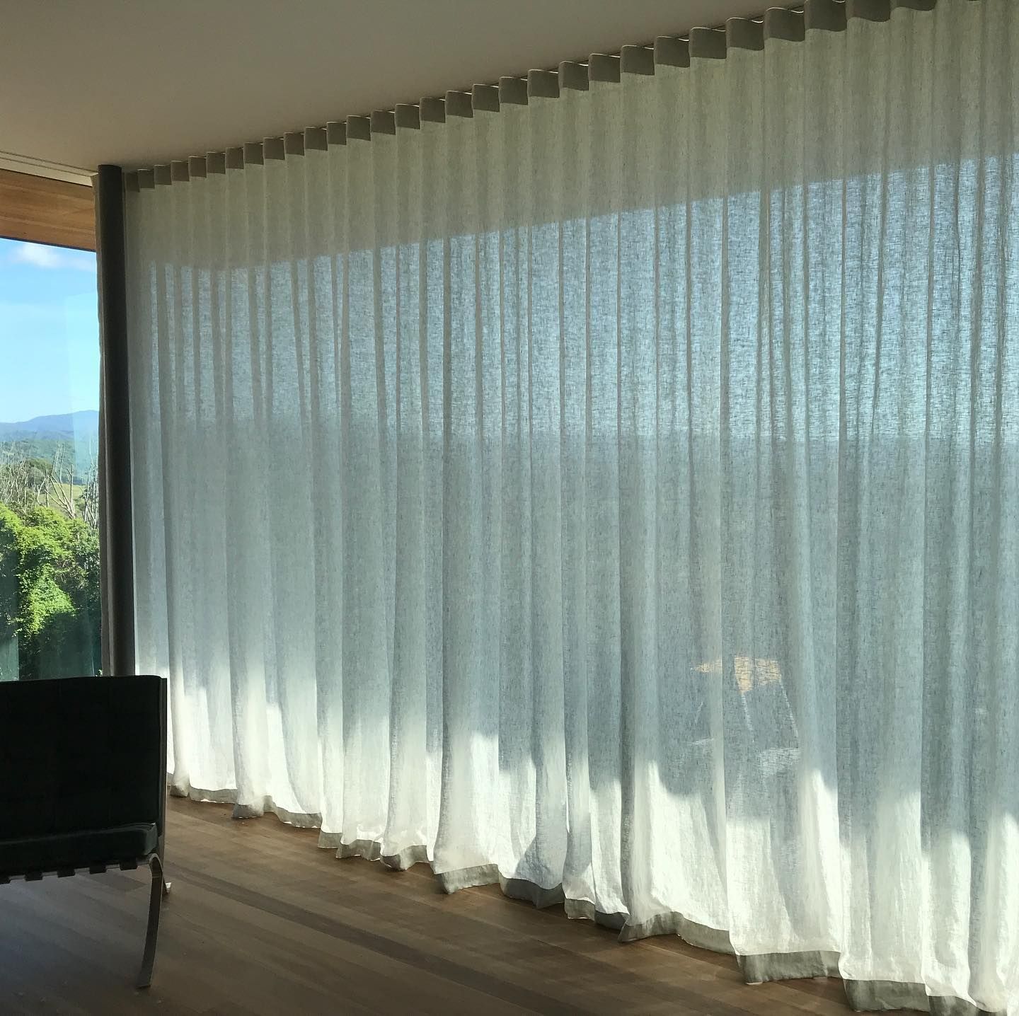Sheer White Curtains Over a Large Window, Light Filtering Through — BlindDESIGN in Byron Bay, NSW
