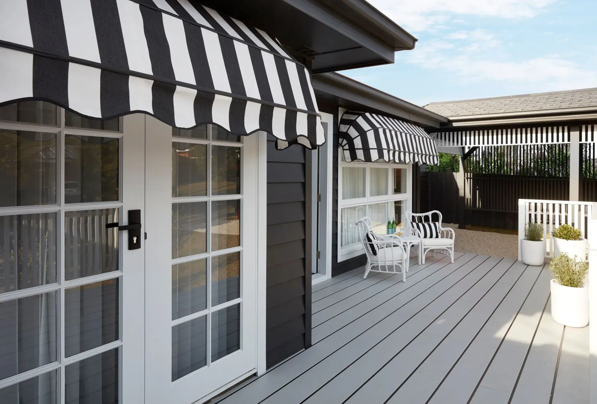 Black and White Striped Awnings Over White-framed Windows — BlindDESIGN in Byron Bay, NSW