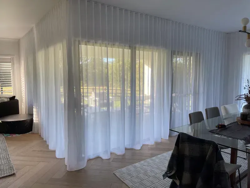 White Sheer Curtains Cover A Large Window — BlindDESIGN in Byron Bay, NSW