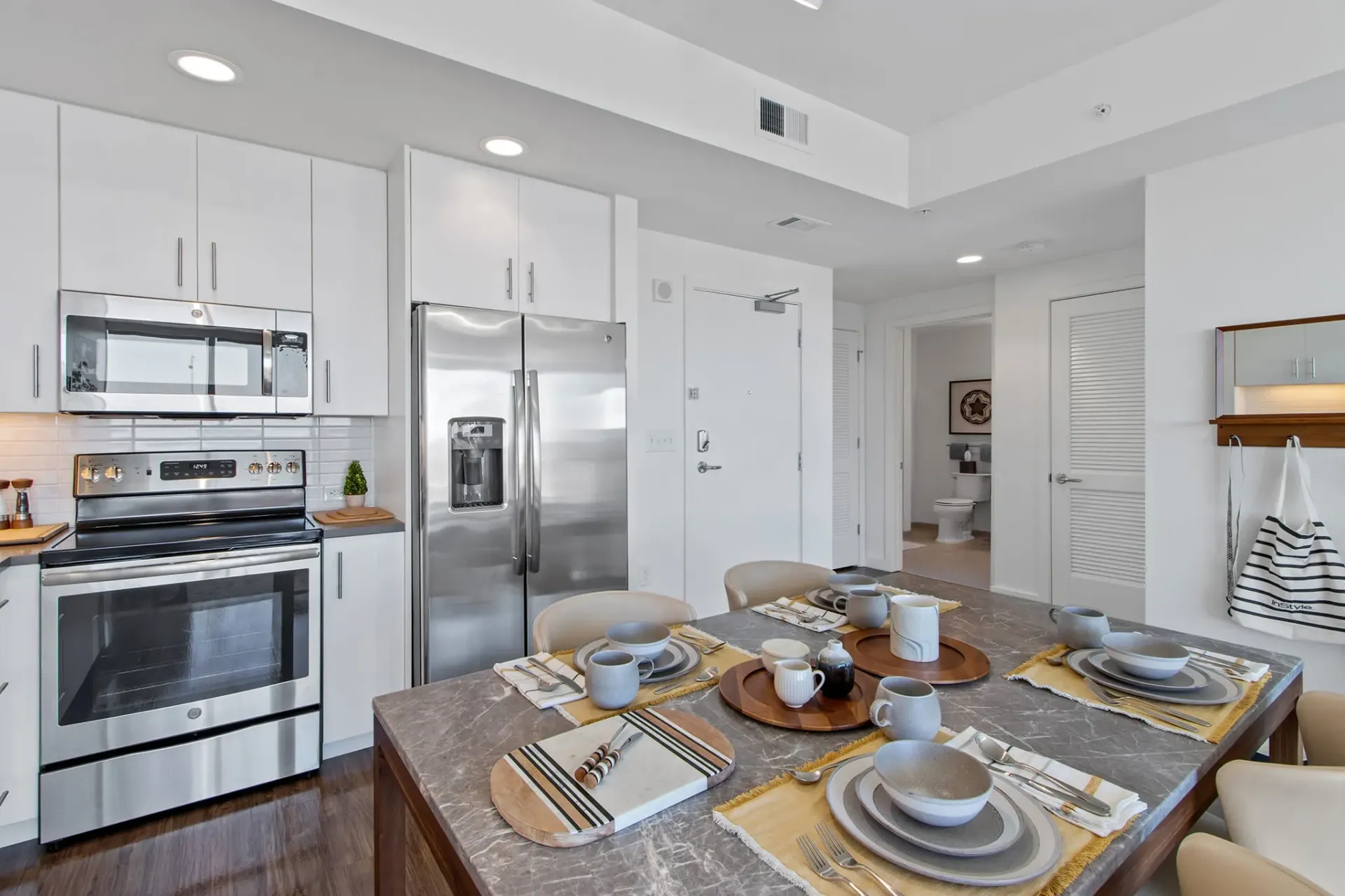 Kitchen and dining area in an apartment at One City Center in Durham, North Carolina