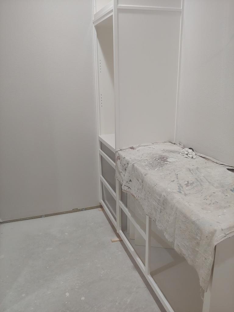 There is a bed in the middle of the room.