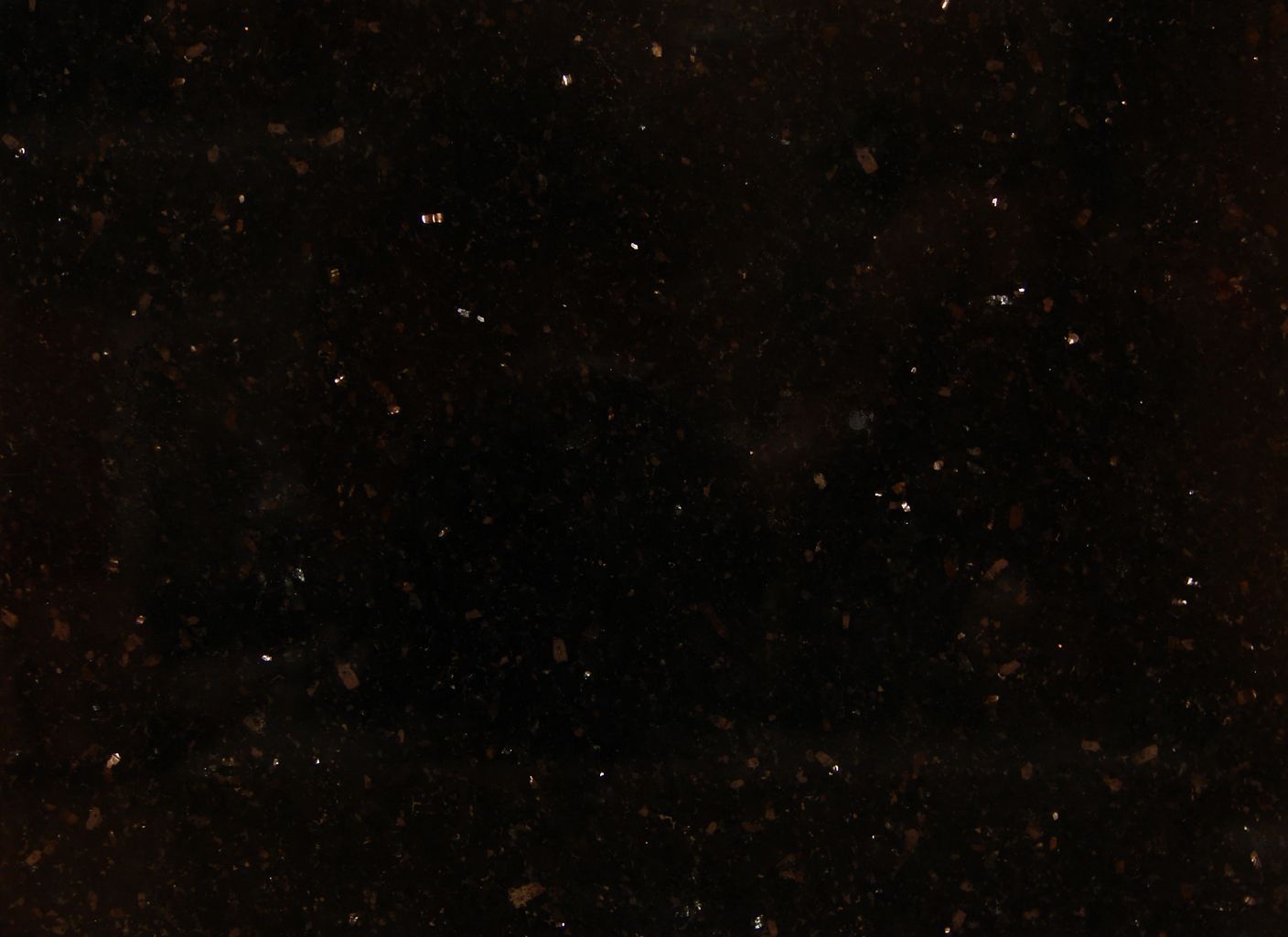 Un primer plano de un fondo negro con muchas estrellas.